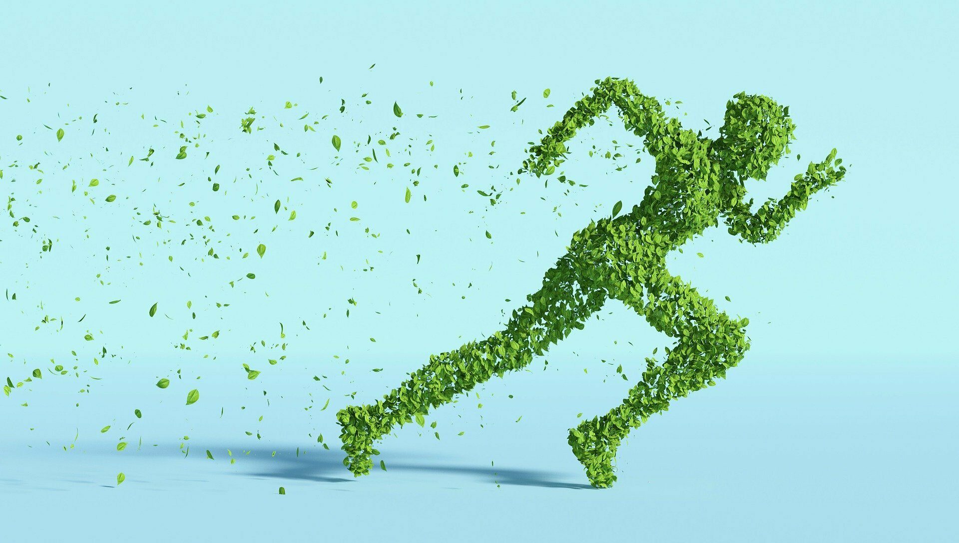 Laufender Mensch, der aus grünen Blätter gestaltet wurde.