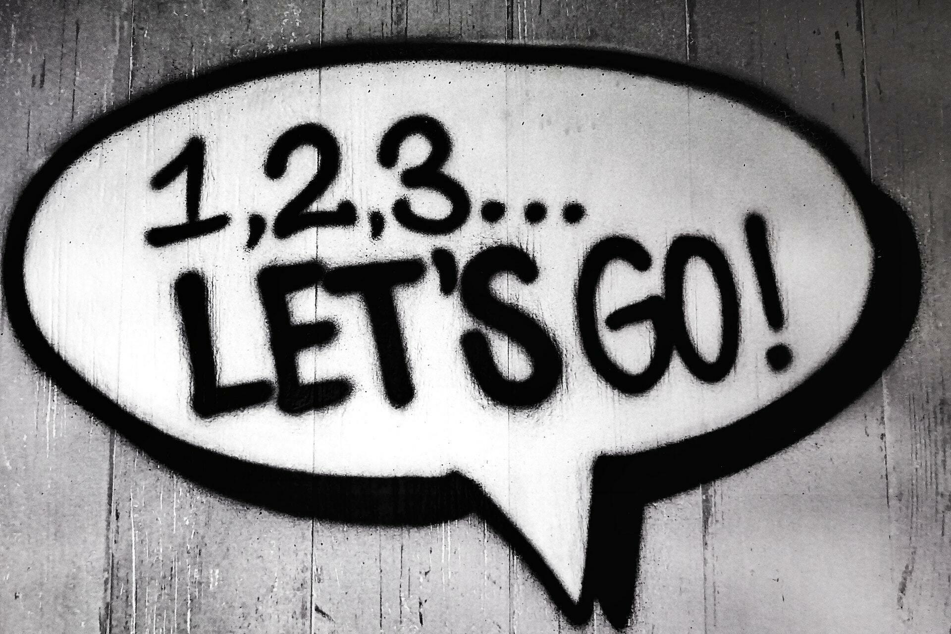 Gedankenblase mit "Let's go!"