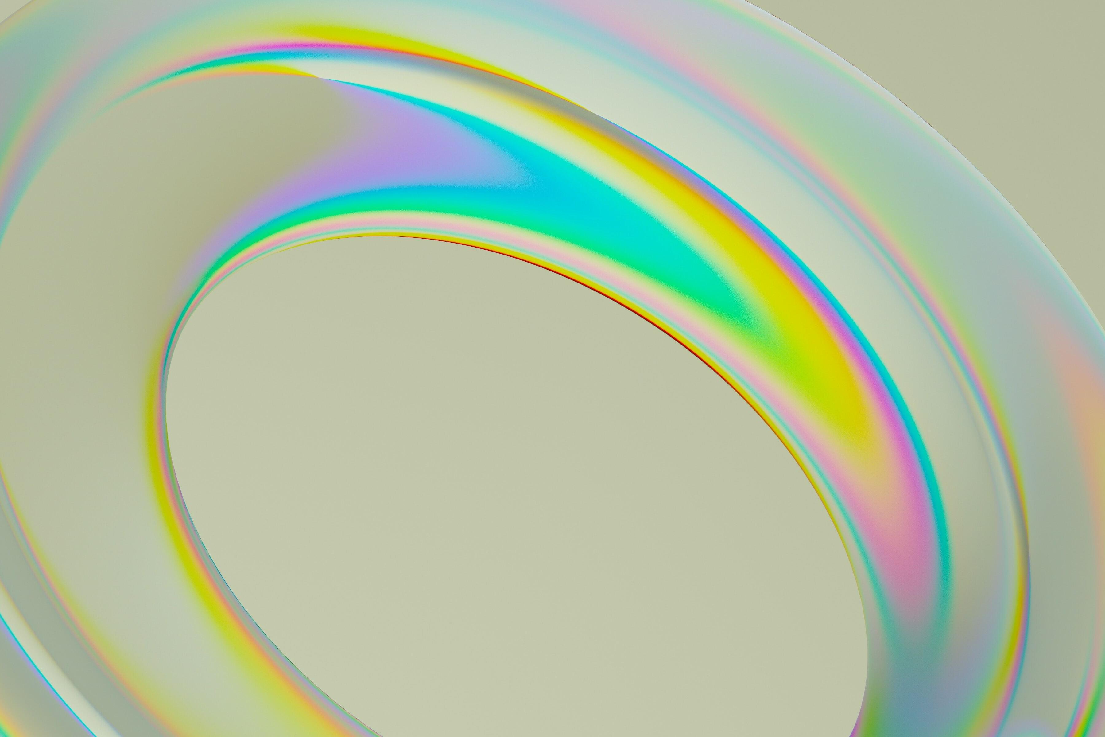 Rundes, bunt schimmerndes Element mit Öffnung in der Mitte als Visualisierung des Themas "Spielraum für Begabungsförderung".