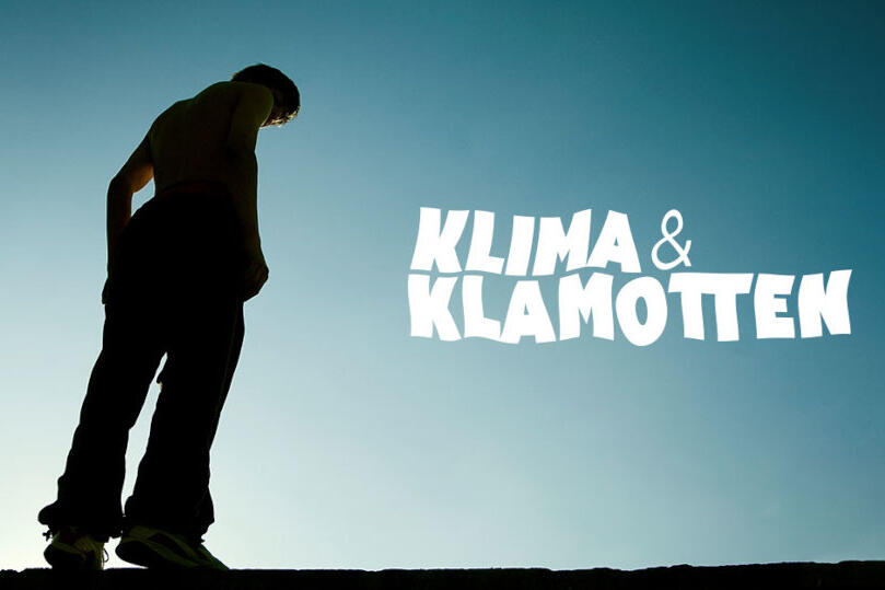 Mensch neben Ausdruck Klima&Klamotten