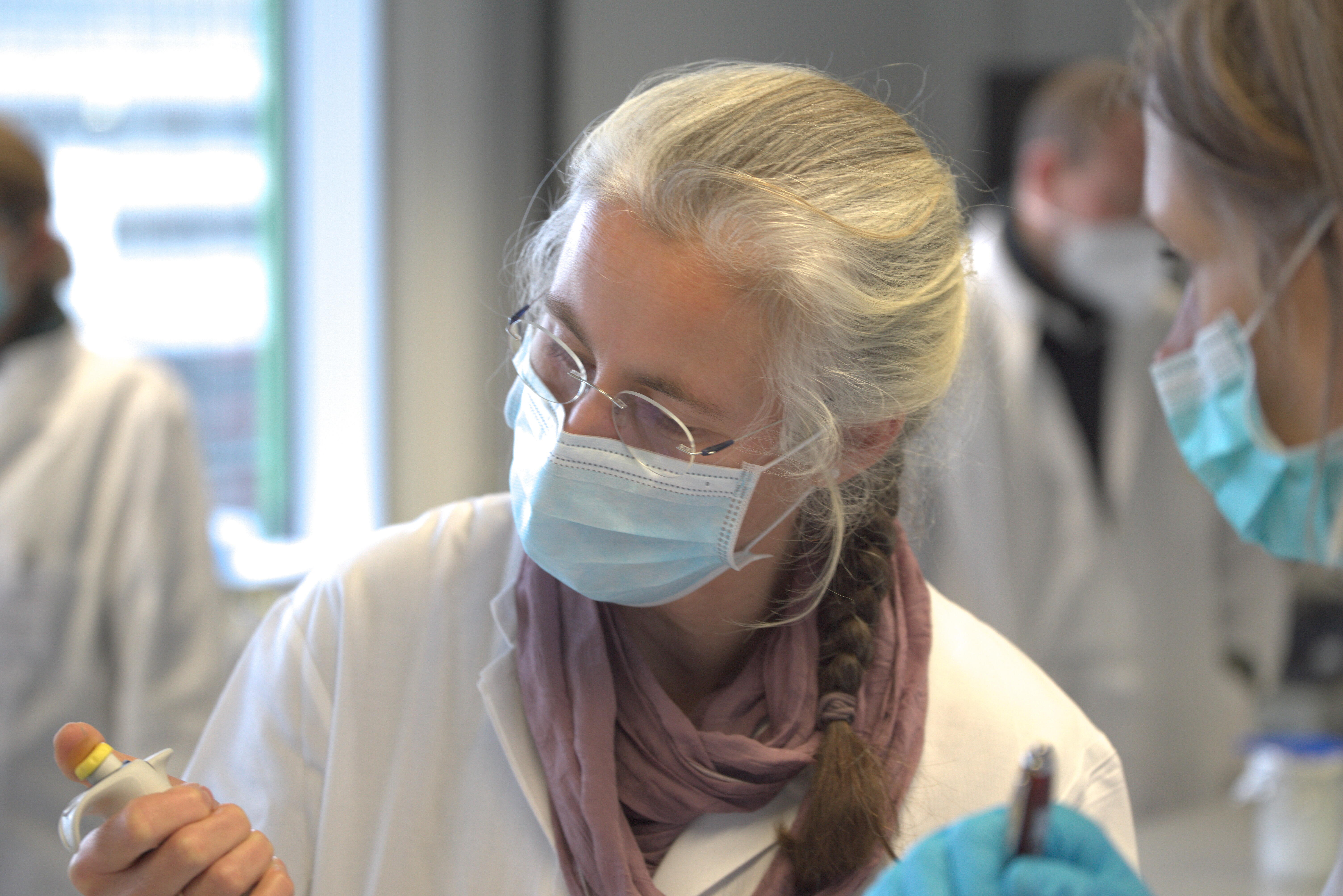 Foto Lehrkräfte im Labor