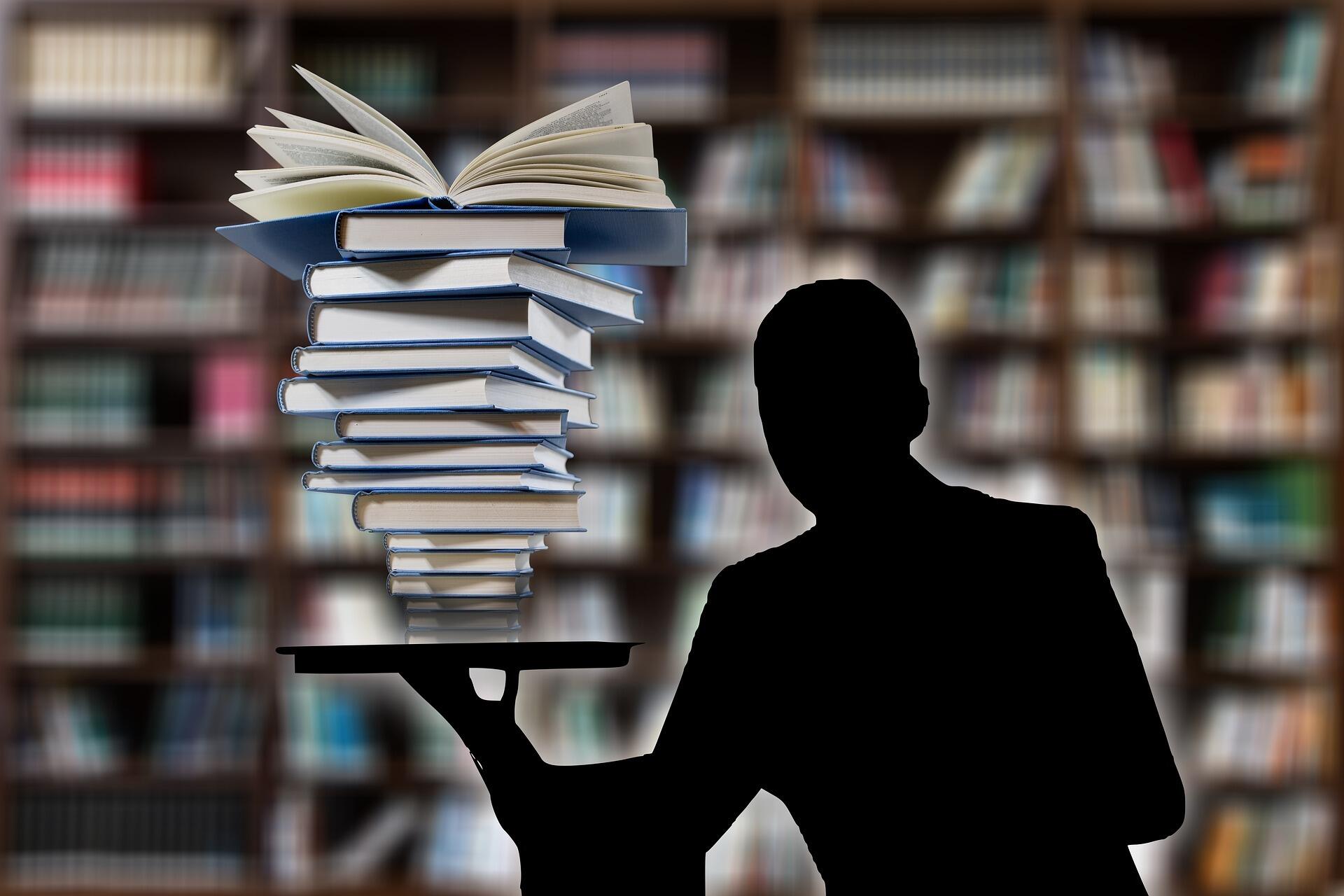 Abbildung einer Schattengestalt vor einem Bücherregal mit Büchern in der Hand