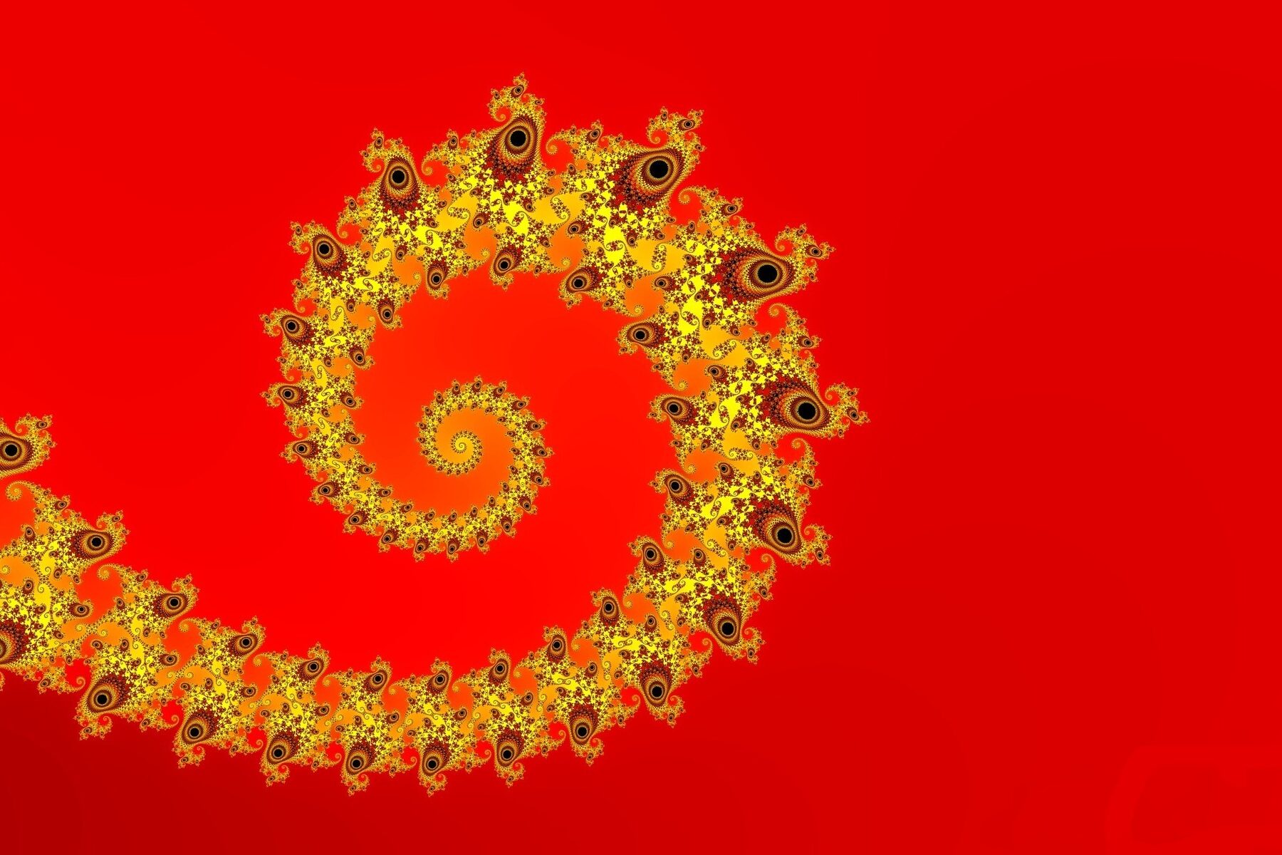 Ein Fraktal von Mandelbrot vor rotem Hintergrund.